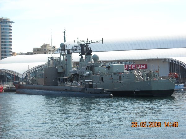 Ship and sub in harbour