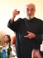 Armenian Priest Giving Toast at House