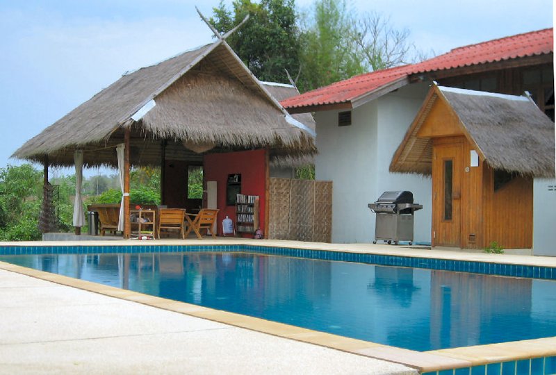 Open-air lounge and pool at Quinlan's in the beautiful countryside outside Pai, Thailand