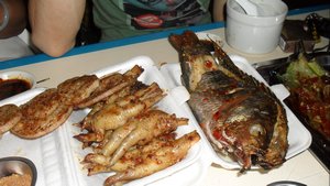 Chicken feet and fish.