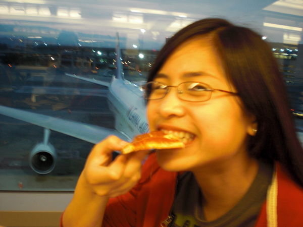 This is my daughter Robyn having dinner at sf airport before our trip