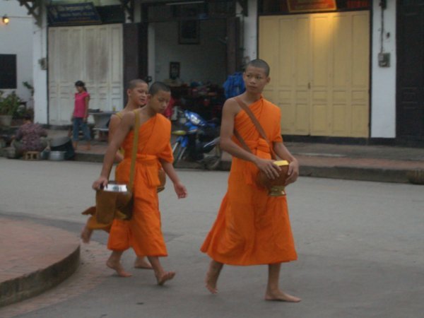 Monks receiving alms