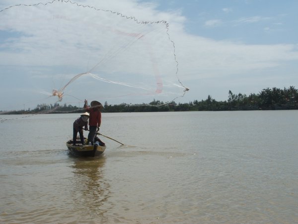 Traditional fishing on Thu Bon River