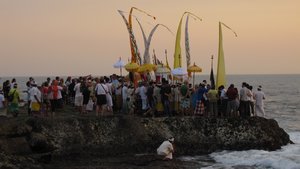 The procession to the water at sunset