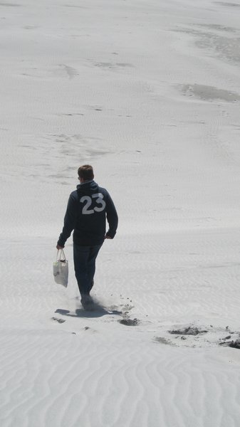 tel makes his way down the dunes
