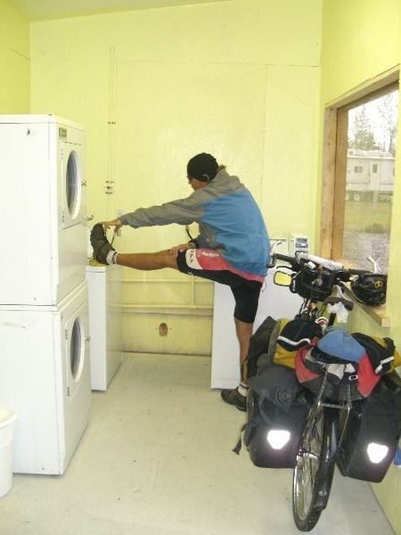 Alain stretching in the laundry room 
