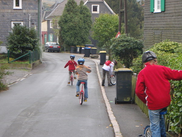 4 German Kids on Unicycles