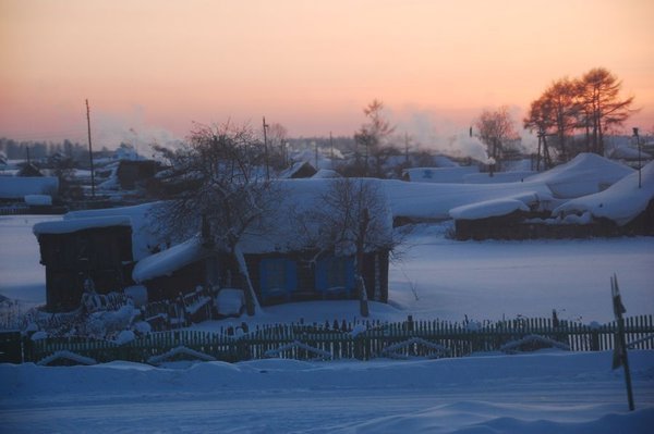 Maisons sous la neige