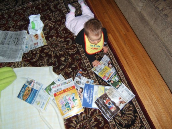 Helping Mommy go through the coupon section