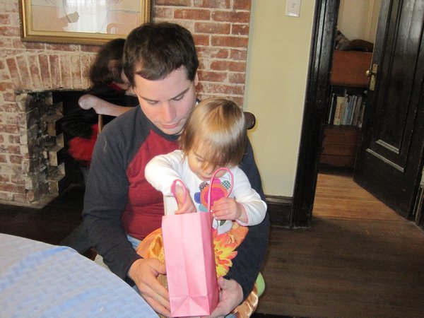 Checking out your goodie bag with Daddy.