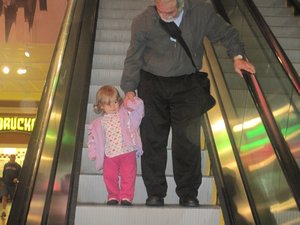 Let's go on the escalator again Grandpa!