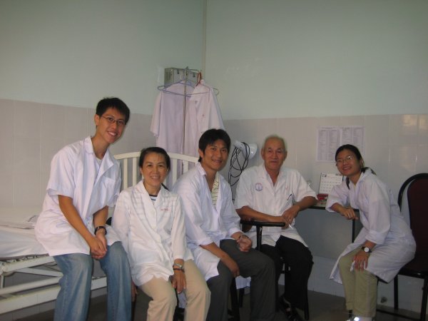 Us with nurse Huyen and Dr. Son
