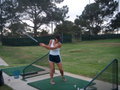 Amy attempting to play golf at Tory Pines