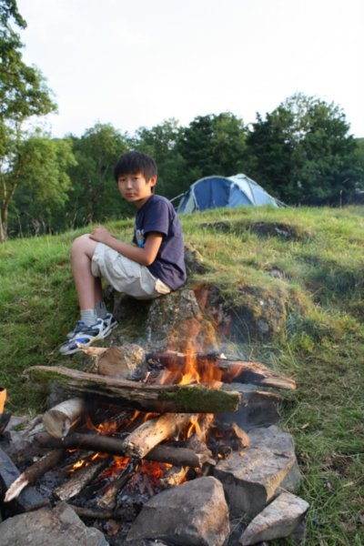 Sang Hyuk and a campfire