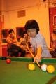 Ji Na playing pool