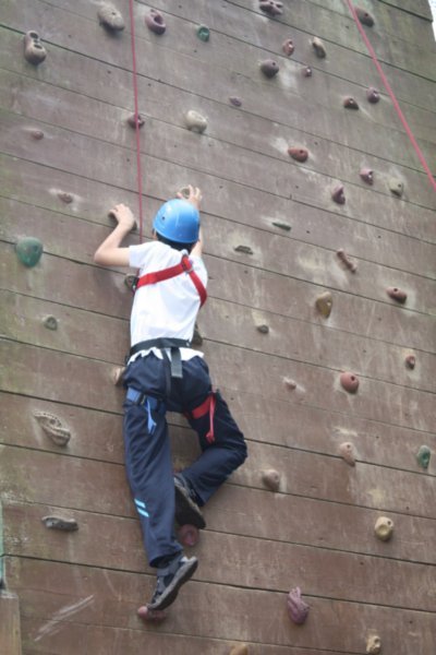 Shawn climbing the wall
