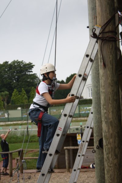 Young Kwon climbing the trapeze