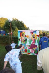 Young Kwon throwing a wet sponge at the PGL staff during the summer fair