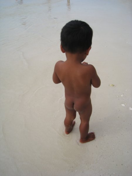 a child in his birthday suit