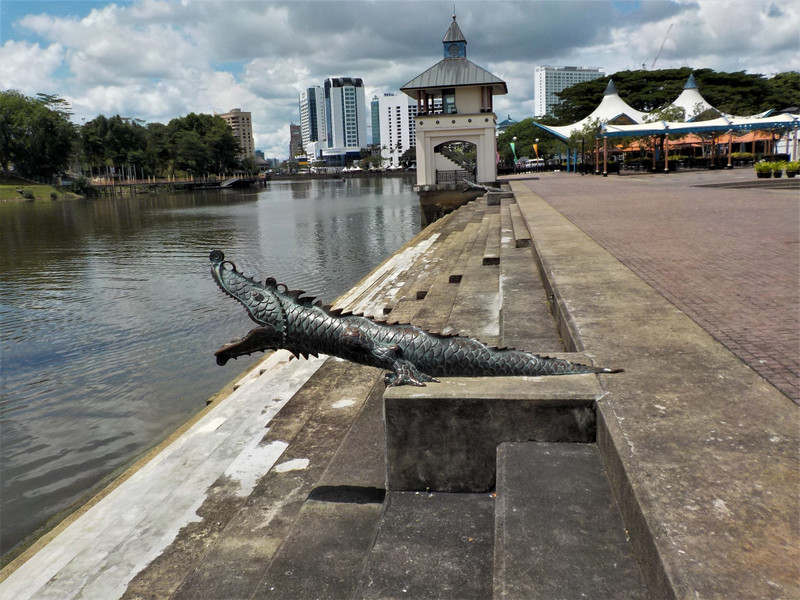 Crocodiles guard the old landing stage by the old courthouse