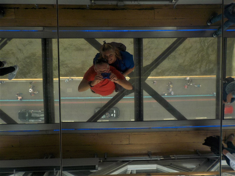 Photo taken in the mirror above the glass walkway