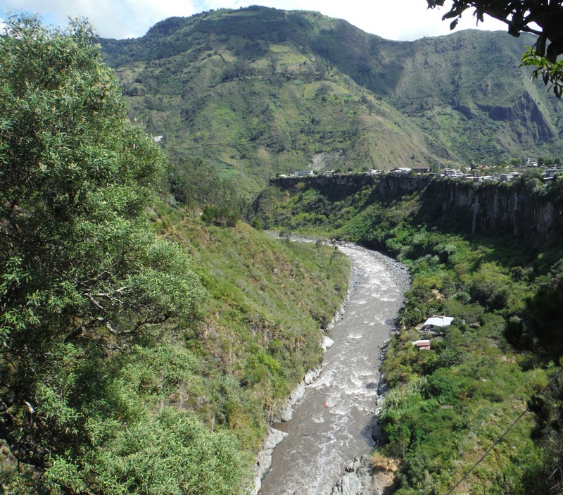 Baños sits on a ledge above the gorge
