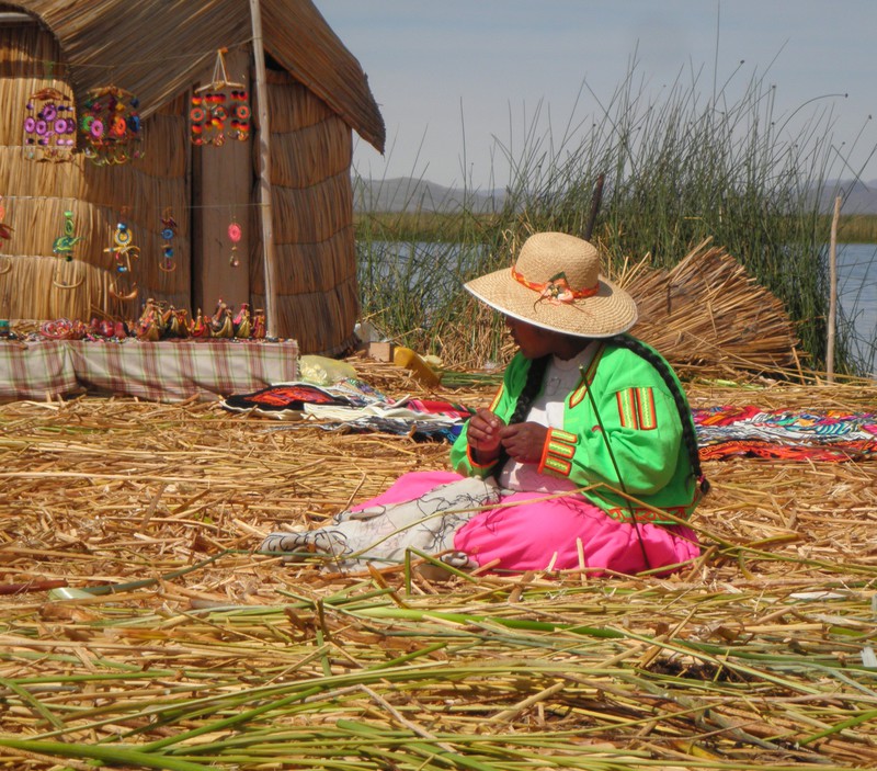 Uros lady doing tapestry