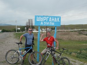 We think this sign says "Welcome to the Capital of Kyrgyzstan"