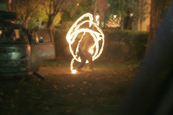 Crusty (?) Fire Twirling VW man.
