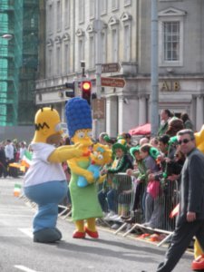 Simpson's Walking Through Street