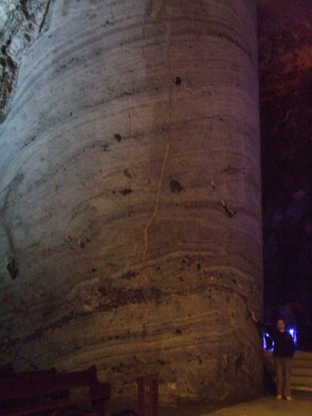 Standing next to one of four huge columns