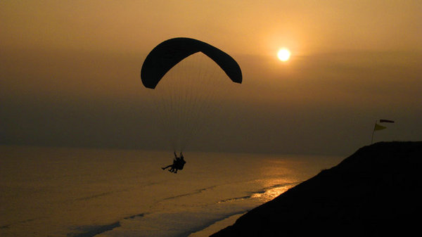 Paragliders over the Lima Coastline