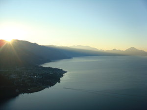 The sun rises over Lake Atitlan
