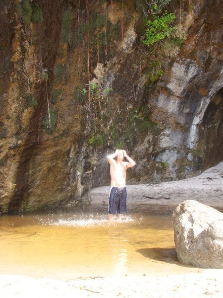 Bathing in the fresh water at Cathedral cove