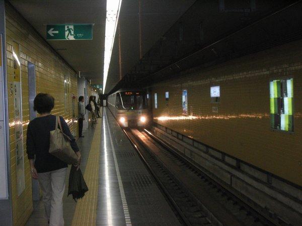 Super-efficient Subway Train arriving at platform