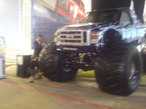 Lachlan and Colin admiring the Monster Truck at the Fair