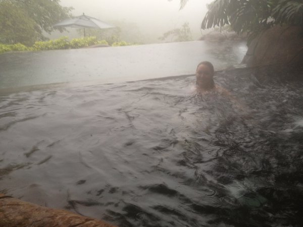 Swimming in the heated pools while the rain falls at the peace lodge
