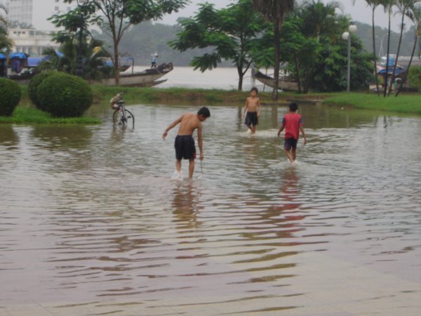 Local kids enjoying the flood