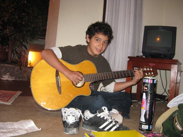 Nicolas playing guitar