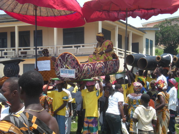 Cape Coast Festival. a chief being carried
