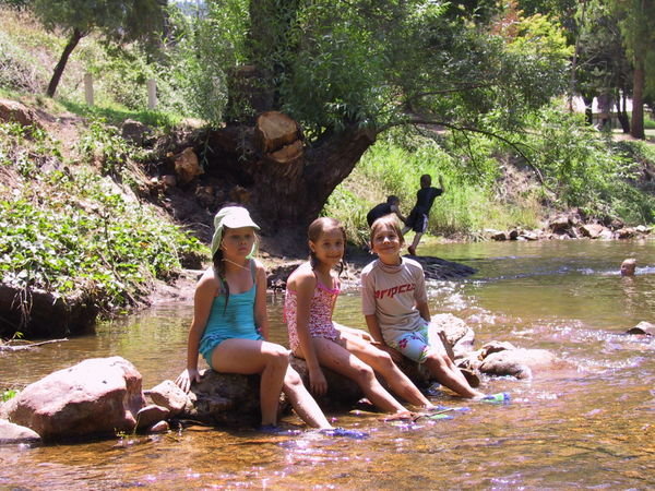 Girls and friend in river
