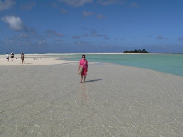 Karen paddling through the water at the sandbar to get to Honeymoon Island