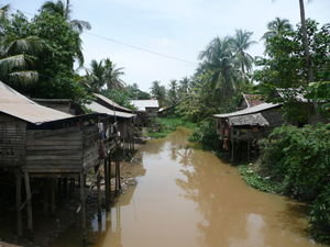 Stilted houses on the Siem Reap river