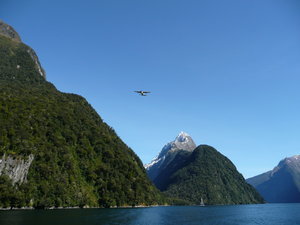 Wee plane flying over Milford Sound 