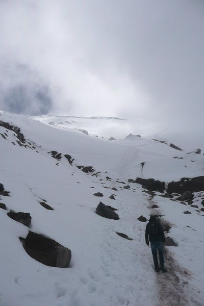 Hiking up Cotopaxi in the clouds