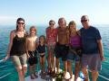 The beautiful Reeves family and us aboard our ship!