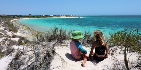 Beautiful, the girls play on the sand dunes above Coral Bay