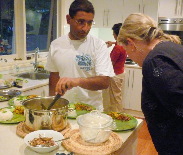 Puneet serves up dinner with Anna's approval!