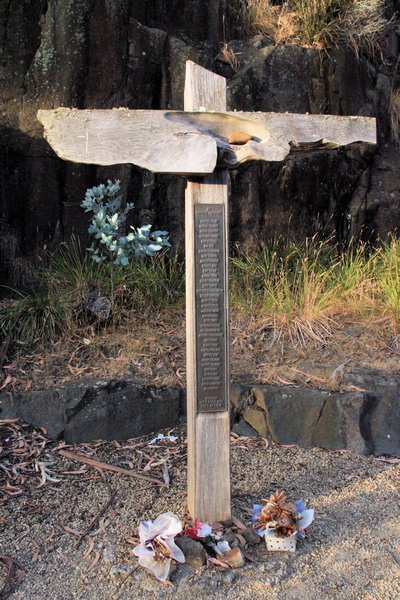The wooden cross in the memorial garden
