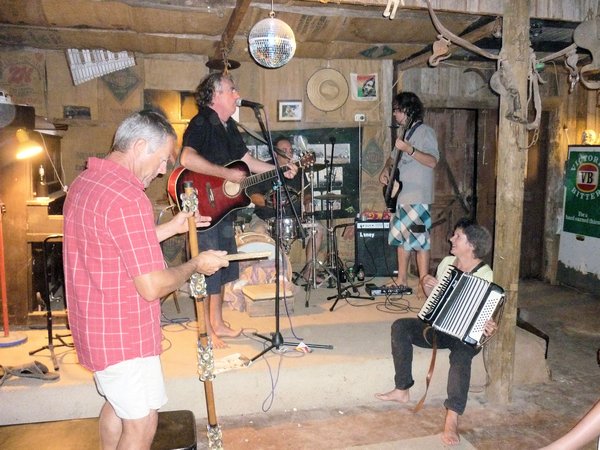 The Strap Ons rehearsing in the shed
